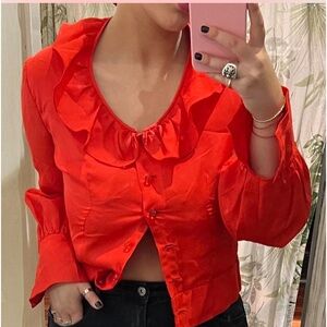 Red ruffled blouse